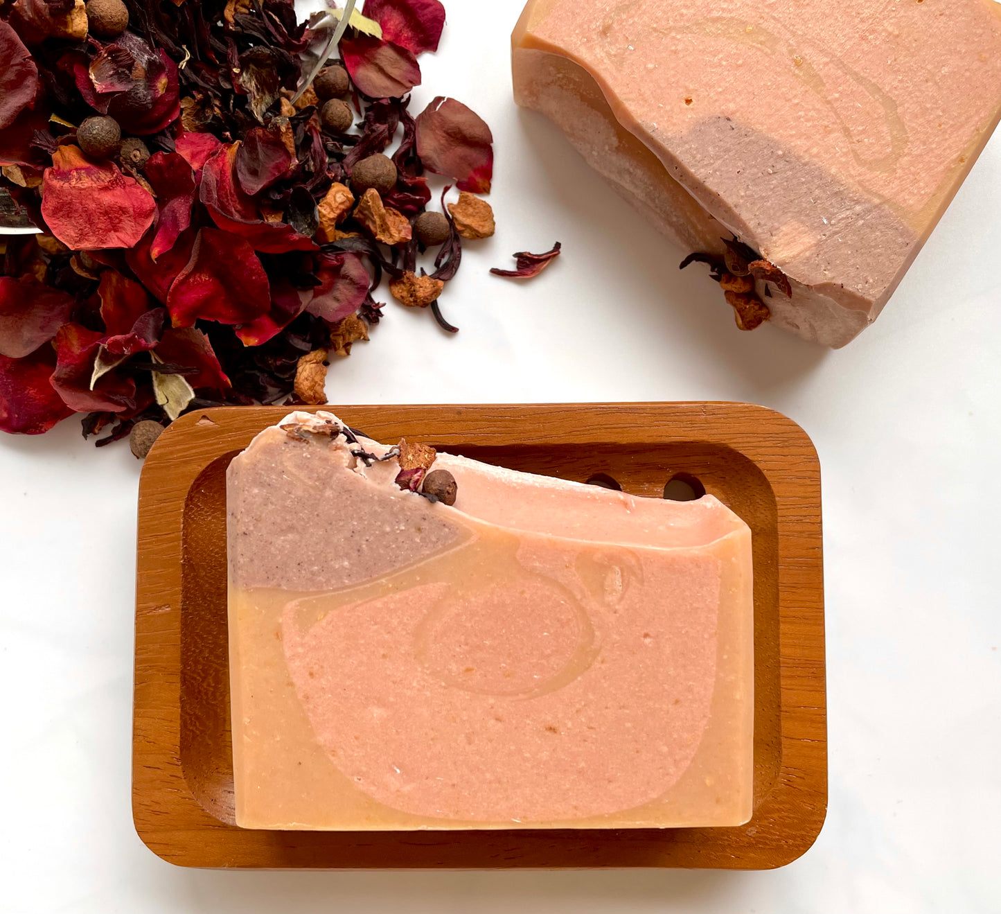 Love Soak contains sea buckthorn oil & purple and rose clays. Topped with rose petals and whole dry spices.